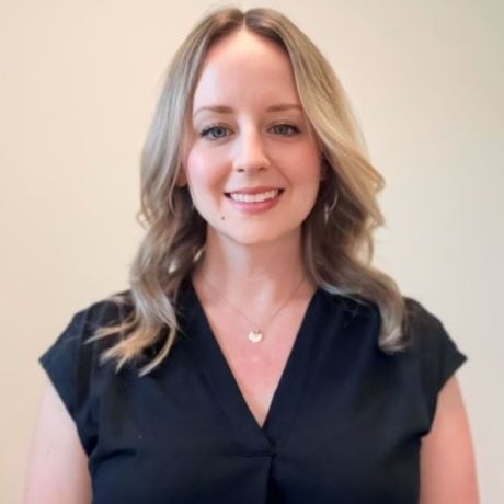 black and white headshot of kelly